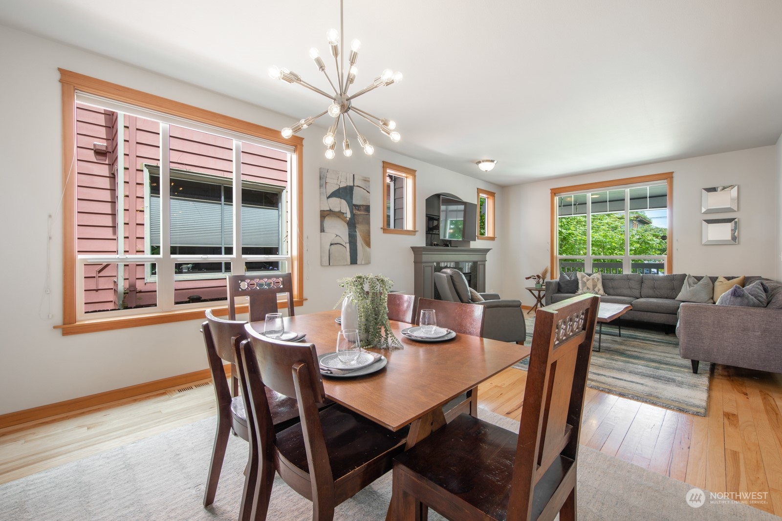 319 18th Avenue Seattle, WA 98122 - Photo 11 of 38 a view of a dining room with furniture window and wooden floor