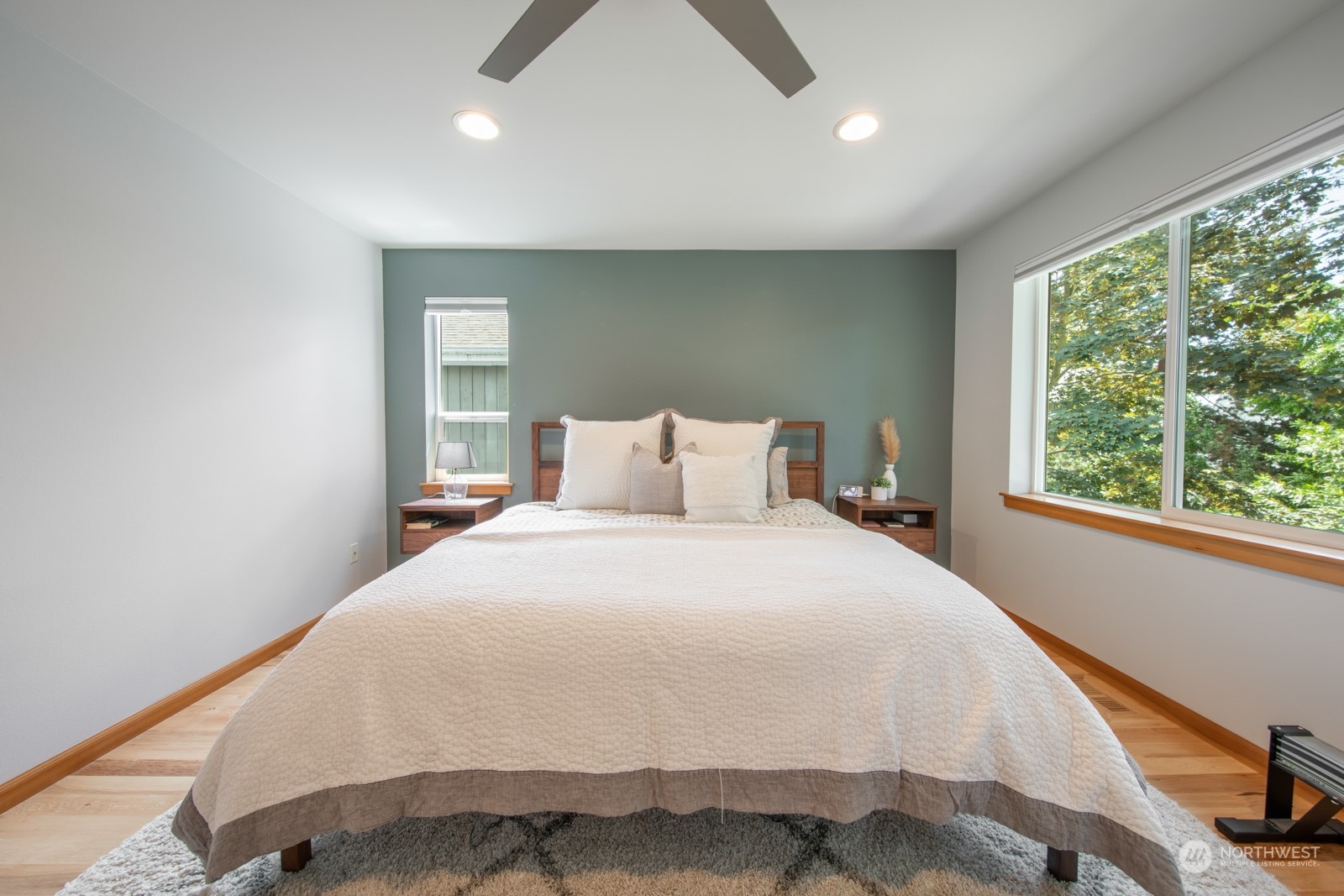 319 18th Avenue Seattle, WA 98122 - Photo 15 of 38 a bedroom with a bed and window