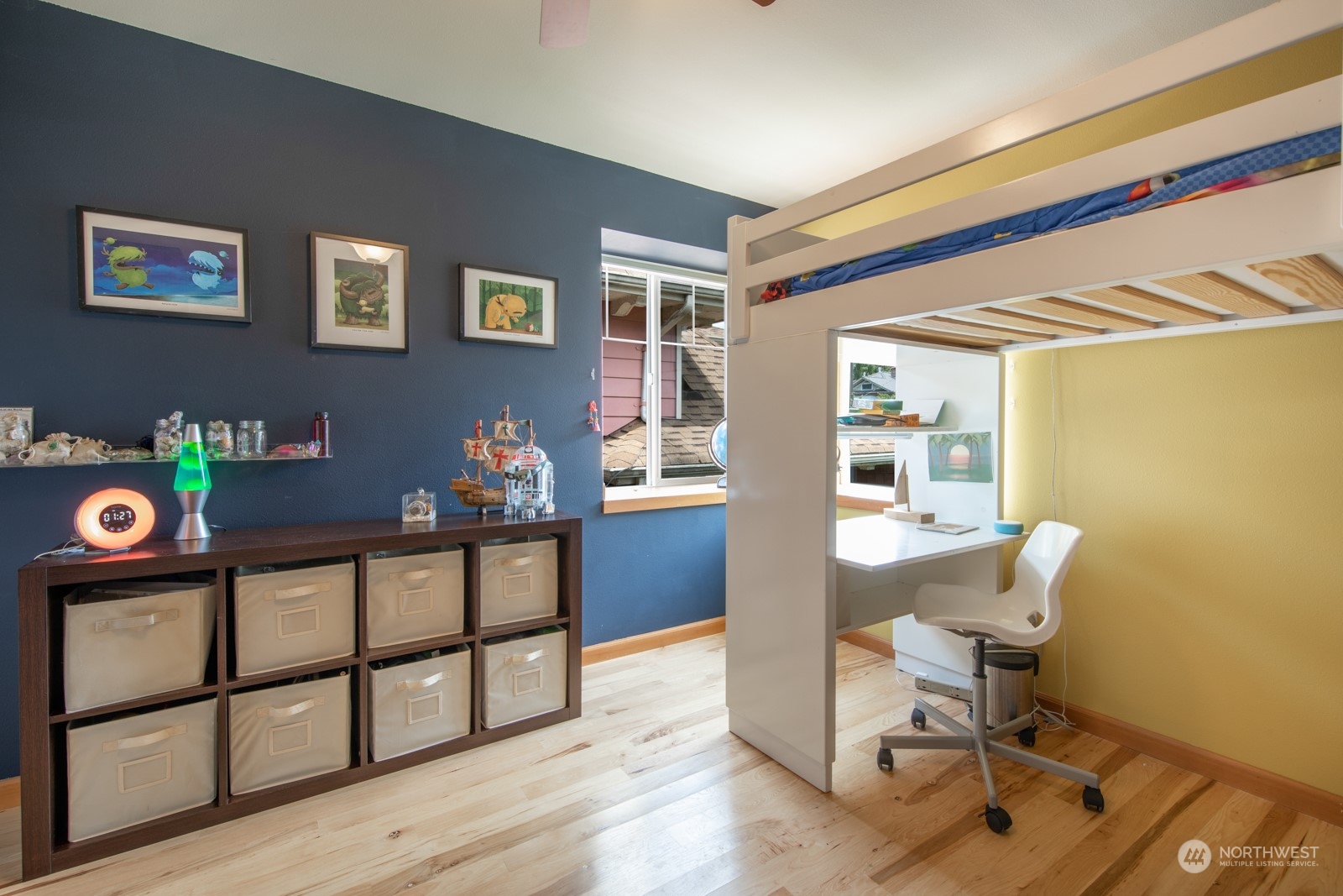 319 18th Avenue Seattle, WA 98122 - Photo 20 of 38 a view of a workspace with furniture and a window