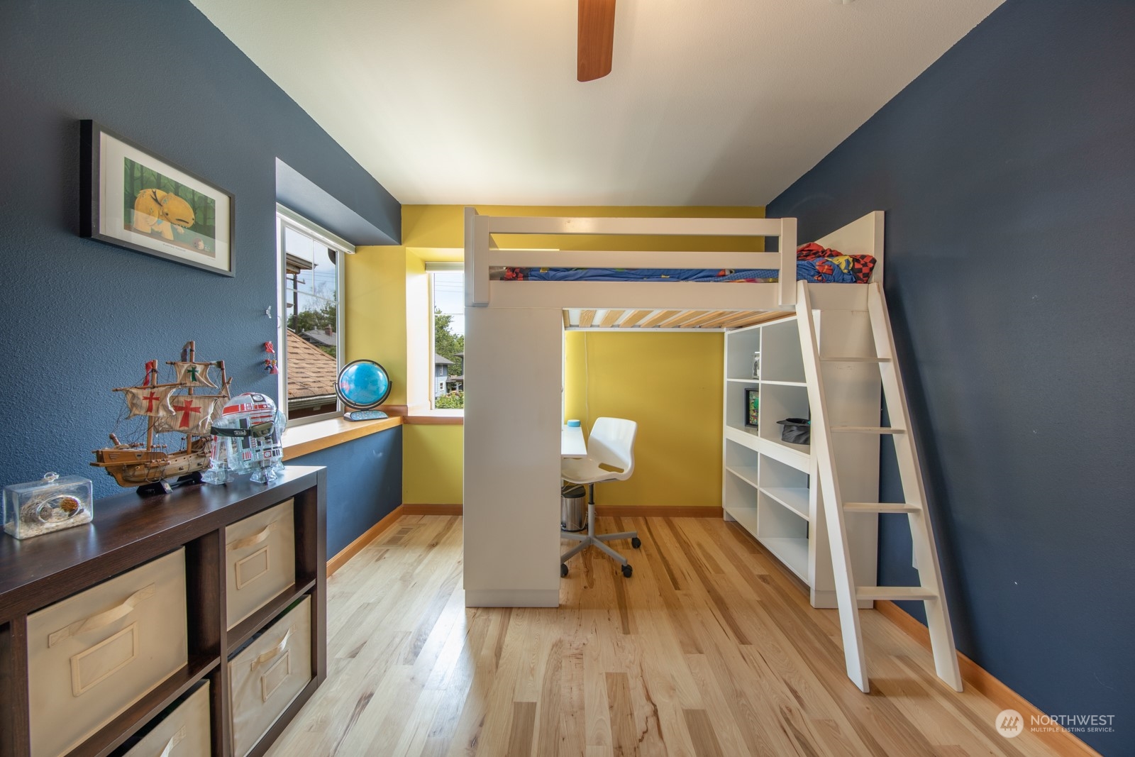 319 18th Avenue Seattle, WA 98122 - Photo 21 of 38 a living room with furniture and a wooden floor