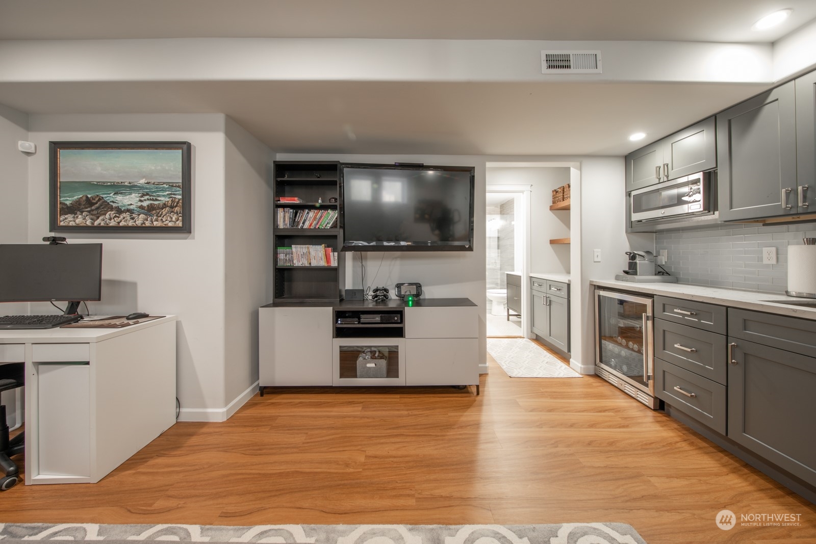 319 18th Avenue Seattle, WA 98122 - Photo 26 of 38 a large kitchen with stainless steel appliances a stove and a refrigerator