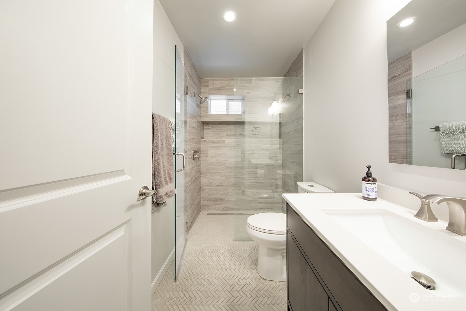 319 18th Avenue Seattle, WA 98122 - Photo 29 of 38 a bathroom with a sink a toilet and shower