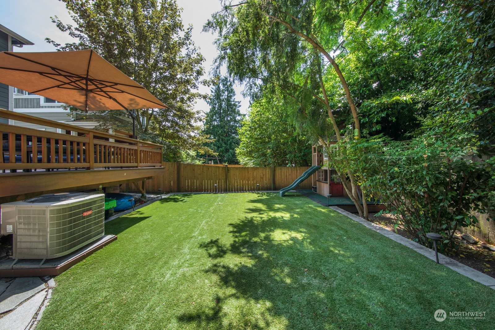 319 18th Avenue Seattle, WA 98122 - Photo 34 of 38 a view of a backyard with a garden
