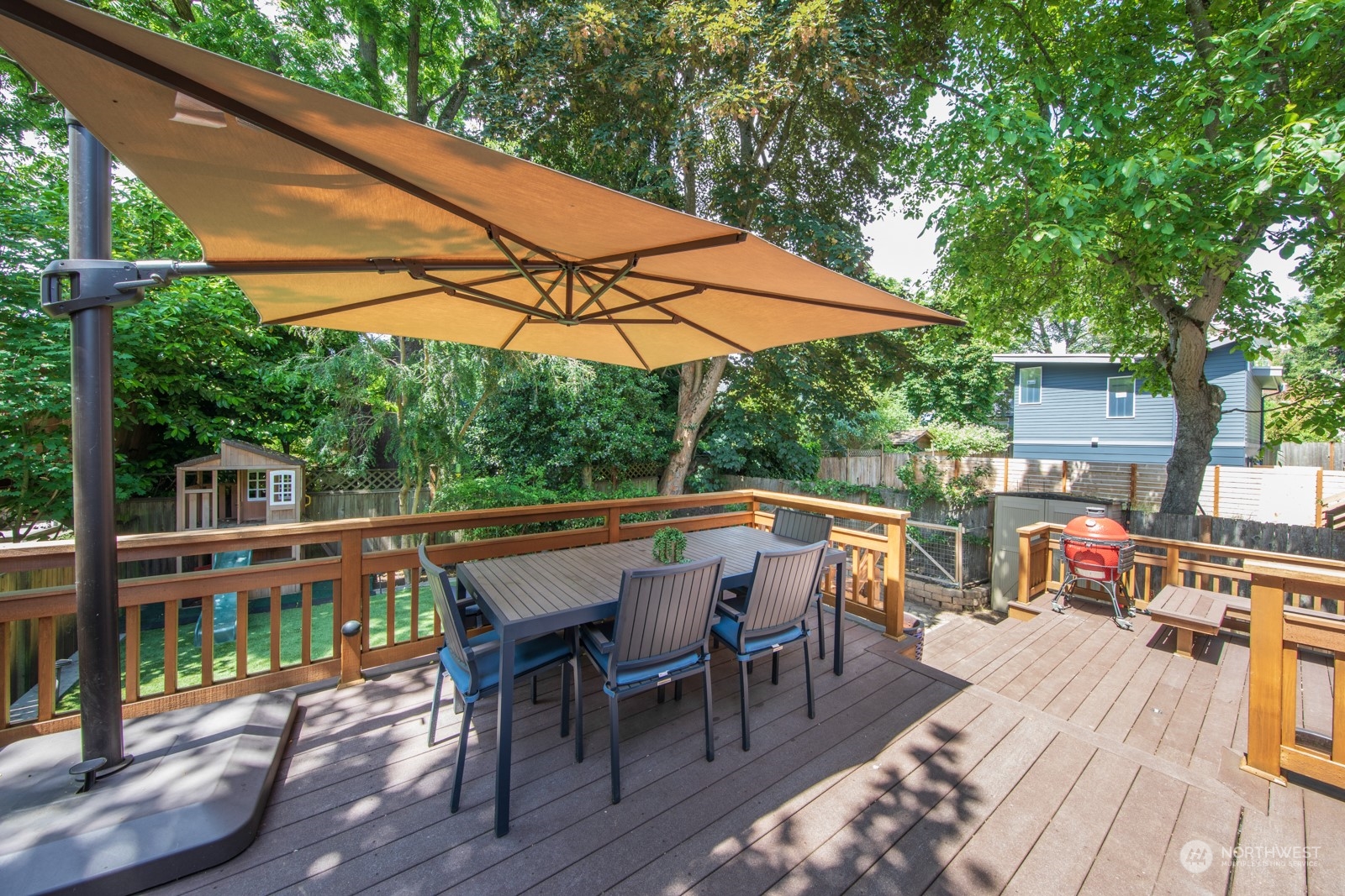 319 18th Avenue Seattle, WA 98122 - Photo 37 of 38 an outdoor space with furniture and umbrella
