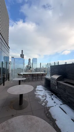a view of a terrace with sitting area