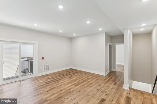 a view of livingroom with wooden floor