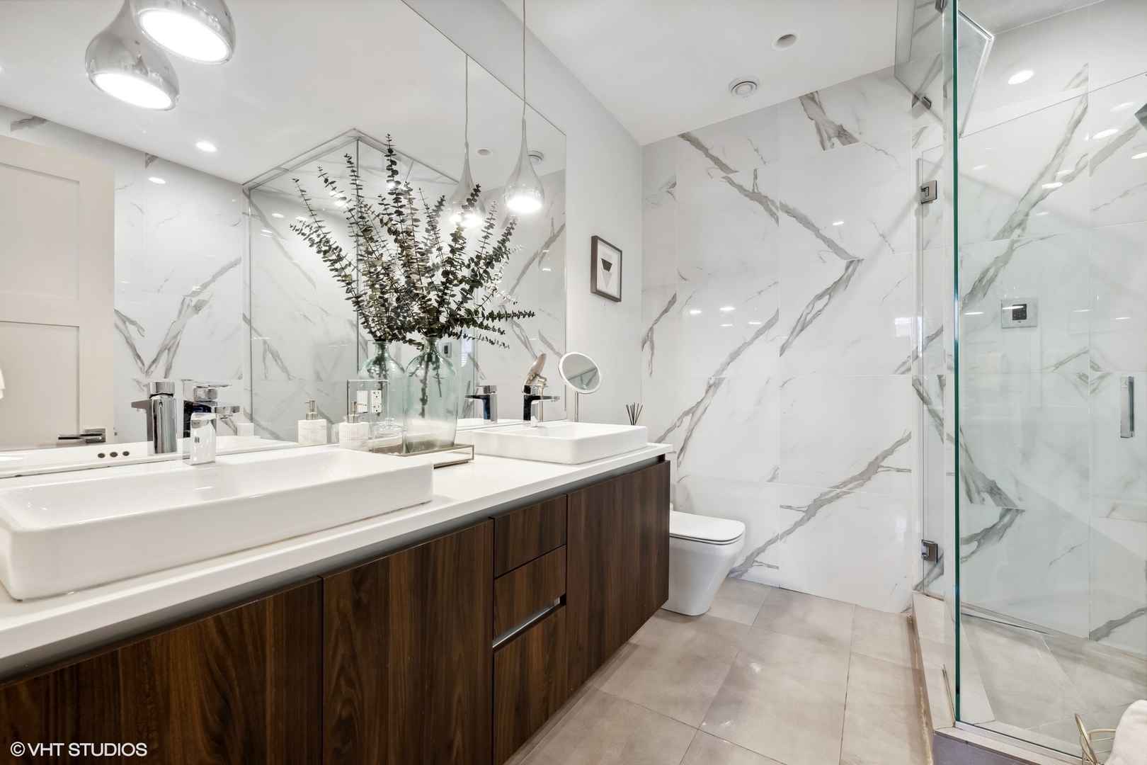 1448 West Chestnut Street, Unit 2 Chicago, IL 60642 - Photo 15 of 20 a bathroom with a double vanity sink and a mirror