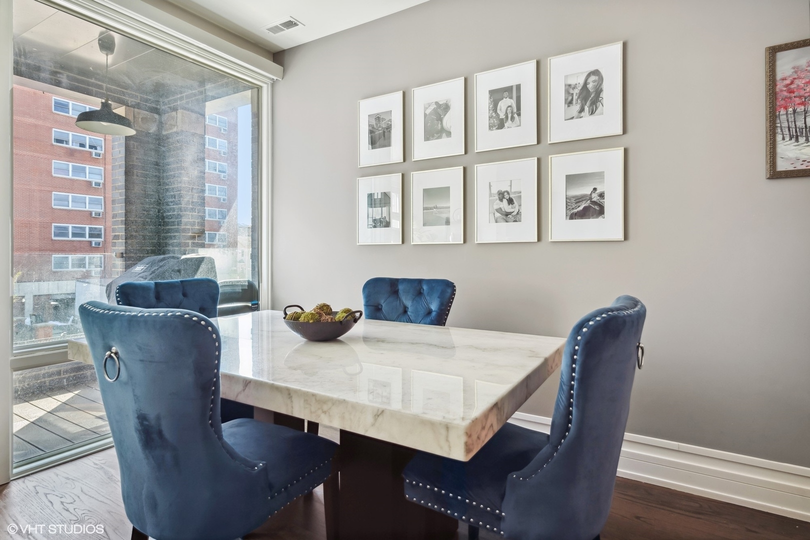 1448 West Chestnut Street, Unit 2 Chicago, IL 60642 - Photo 5 of 20 a view of a dining room with furniture window and wooden floor