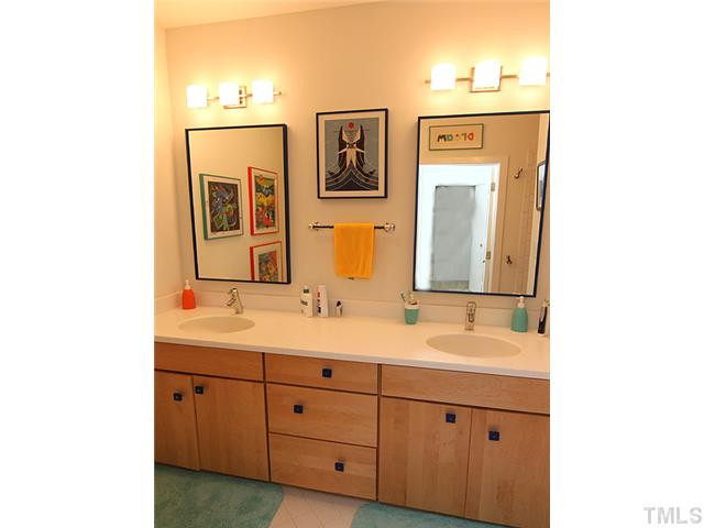 5407 Springfield Drive Raleigh, NC 27609 - Photo 13 of 24 Master ensuite bath with double sinks.