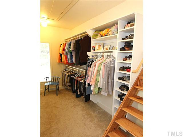 5407 Springfield Drive Raleigh, NC 27609 - Photo 15 of 24 Mstr closet. Stairs to attic area.