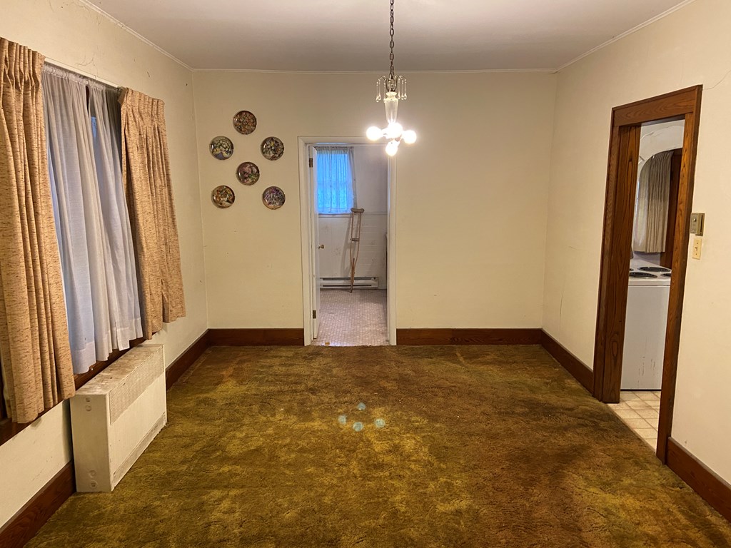 728 South Main Street Knox, PA 16232 - Photo 12 of 15 a view of an empty room with a window