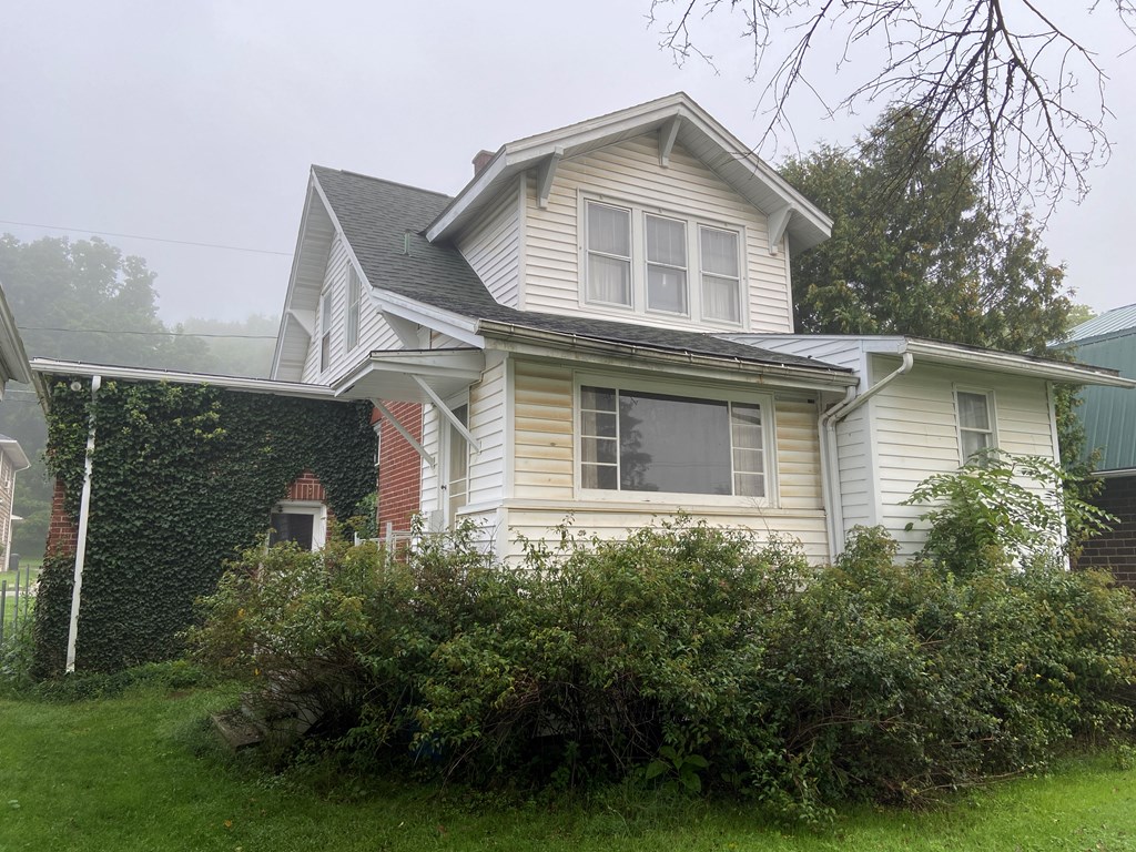 728 South Main Street Knox, PA 16232 - Photo 2 of 15 a front view of a house with a yard