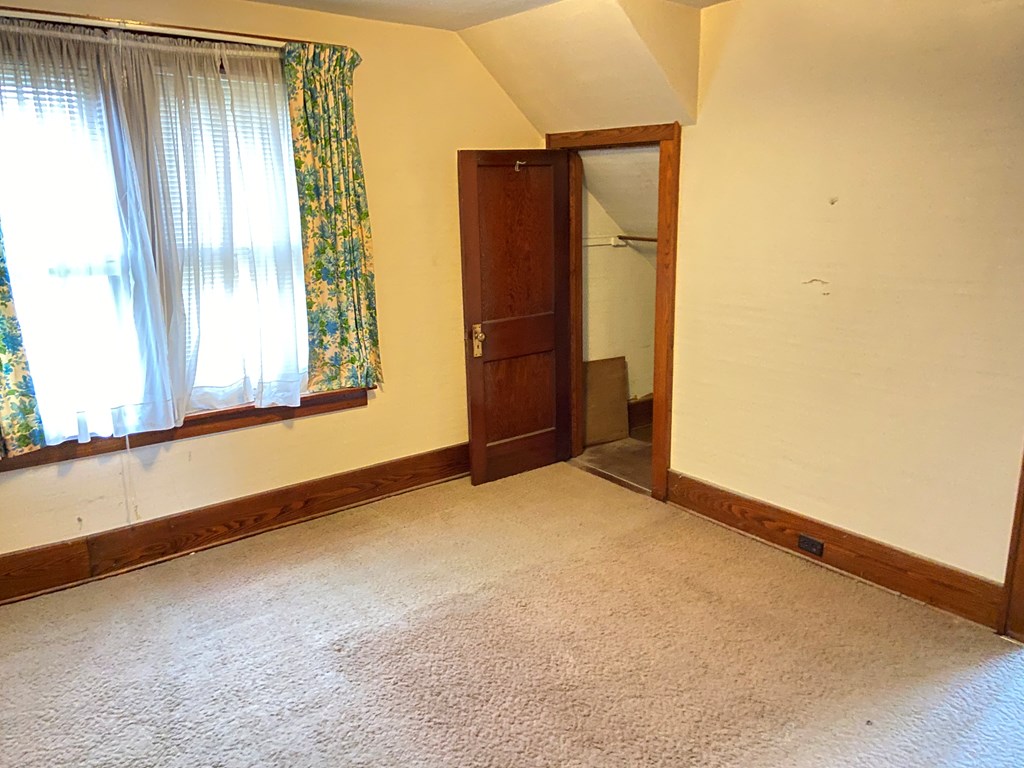 728 South Main Street Knox, PA 16232 - Photo 5 of 15 an empty room with windows