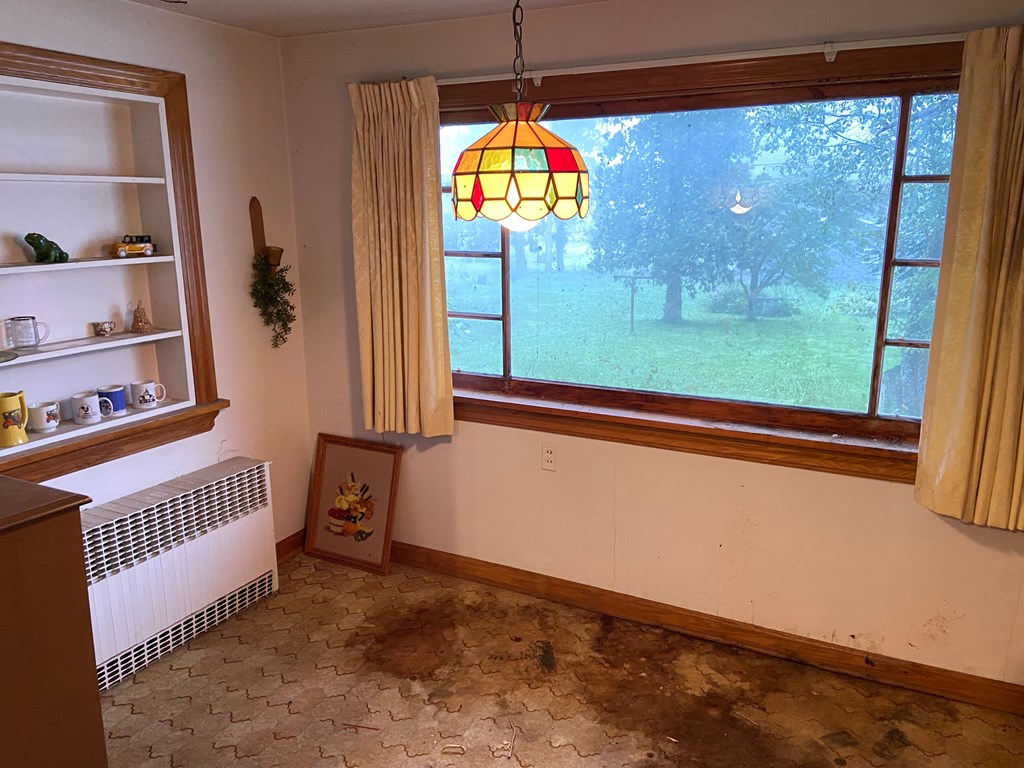 728 South Main Street Knox, PA 16232 - Photo 9 of 15 a view of a hallway view with a floor to ceiling window and entryway