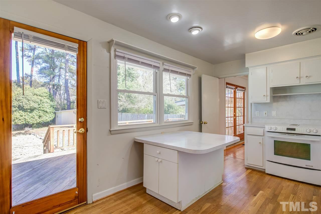 3424 Wade Avenue Raleigh, NC 27607 - Photo 13 of 30 a spacious bathroom with a tub sink and mirror