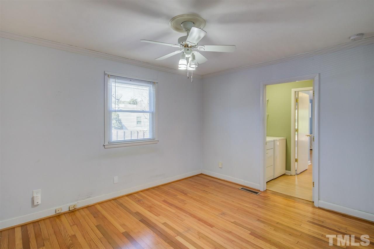 3424 Wade Avenue Raleigh, NC 27607 - Photo 17 of 30 wooden floor in an empty room with a window