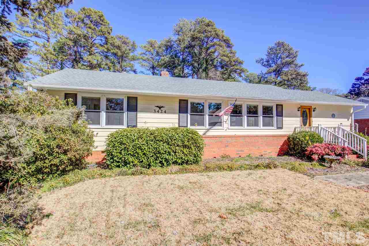 3424 Wade Avenue Raleigh, NC 27607 - Photo 3 of 30 front view of a house with a yard