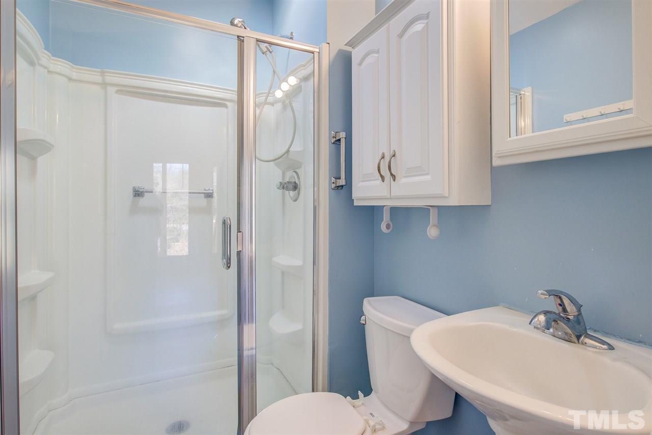 3424 Wade Avenue Raleigh, NC 27607 - Photo 24 of 30 a bathroom with a sink toilet and shower