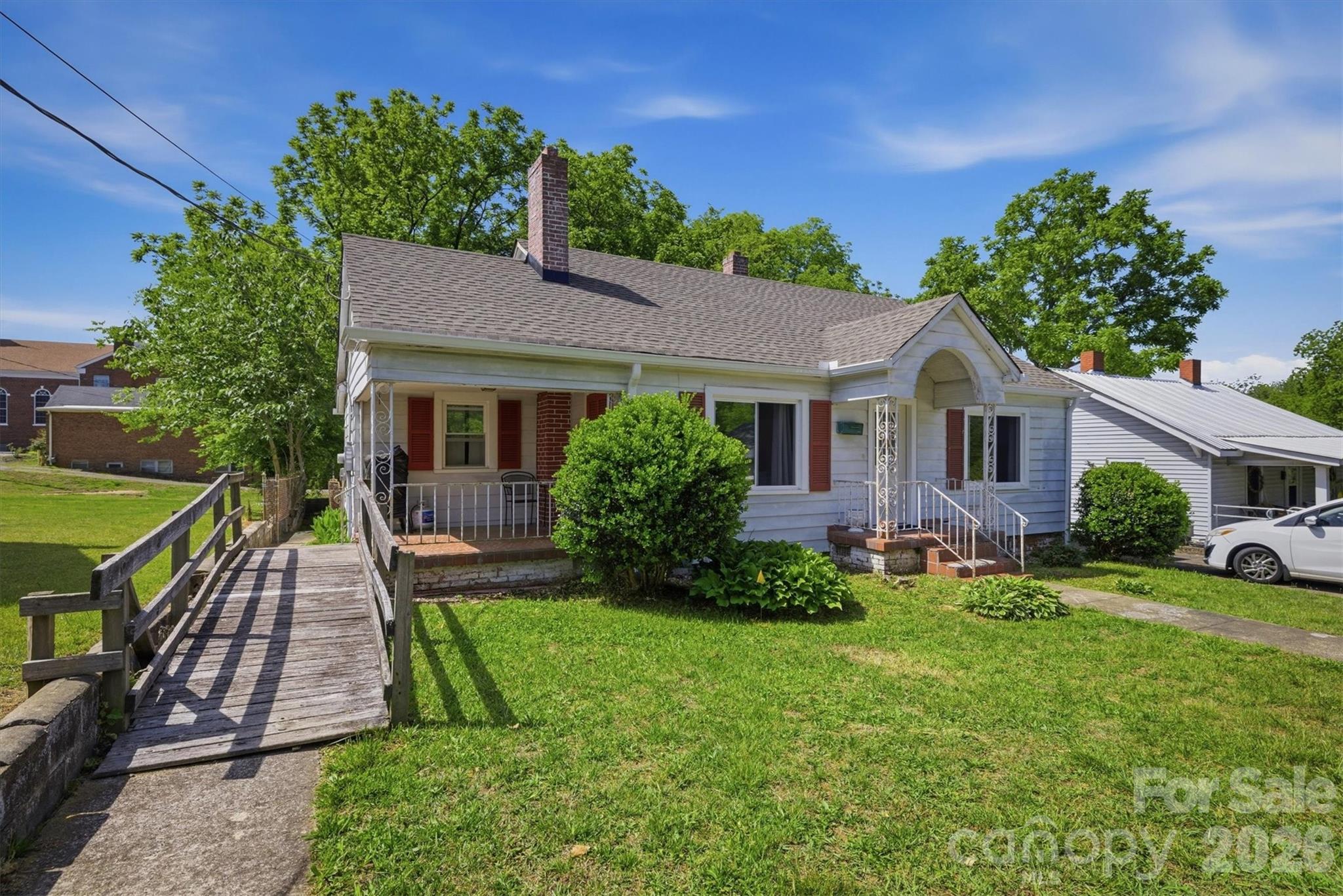 117 3rd Avenue Southwest Hickory, NC 28602 - Photo 2 of 21 a front view of a house with a yard