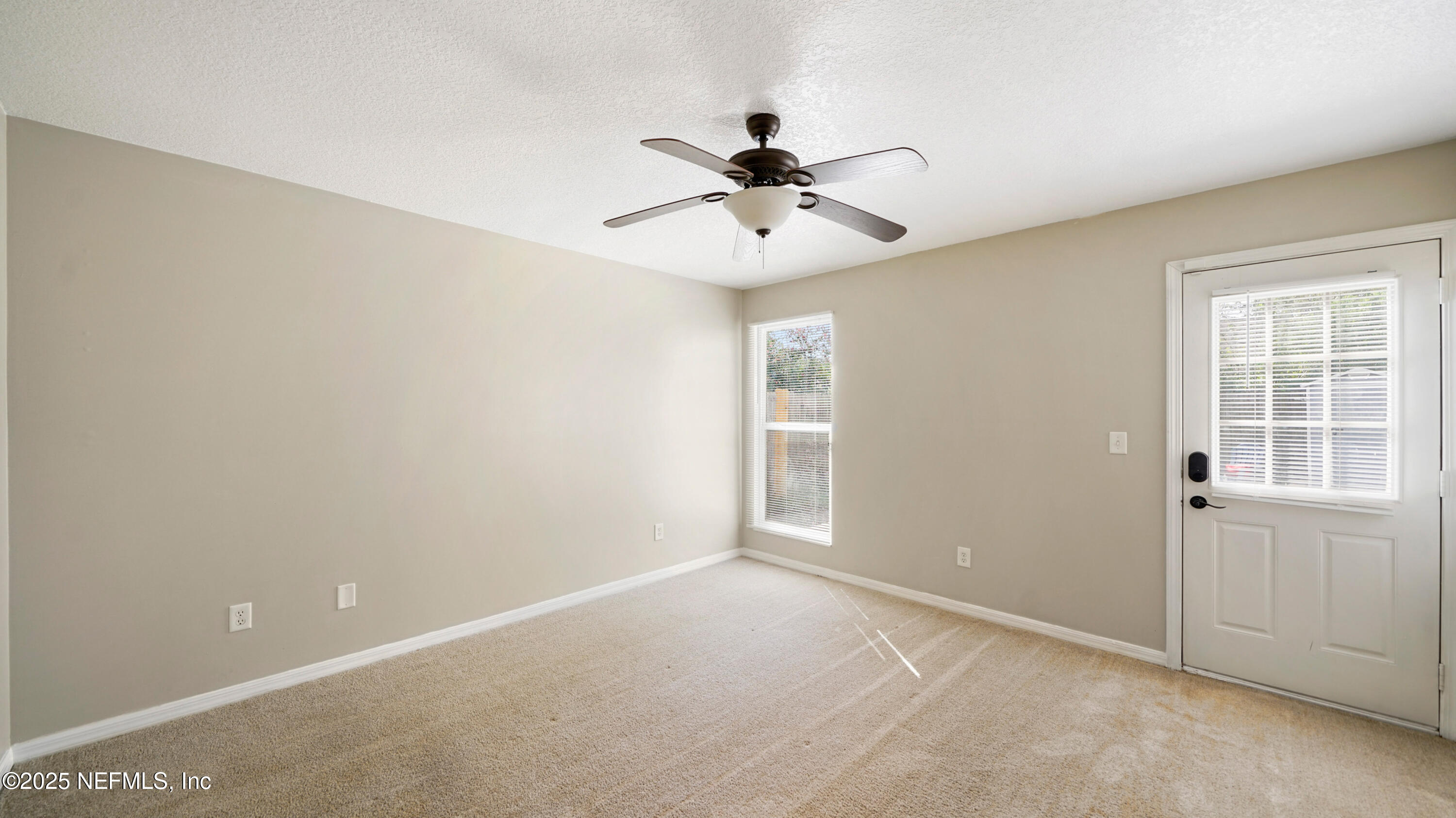 3255 Dowitcher Lane Orange Park, FL 32065 - Photo 14 of 27 a view of an empty room with a window
