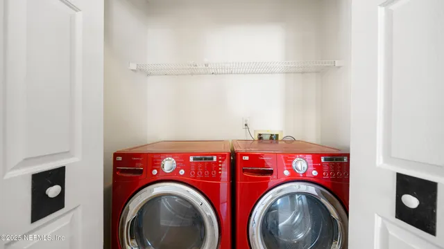 a utility room with dryer and washer