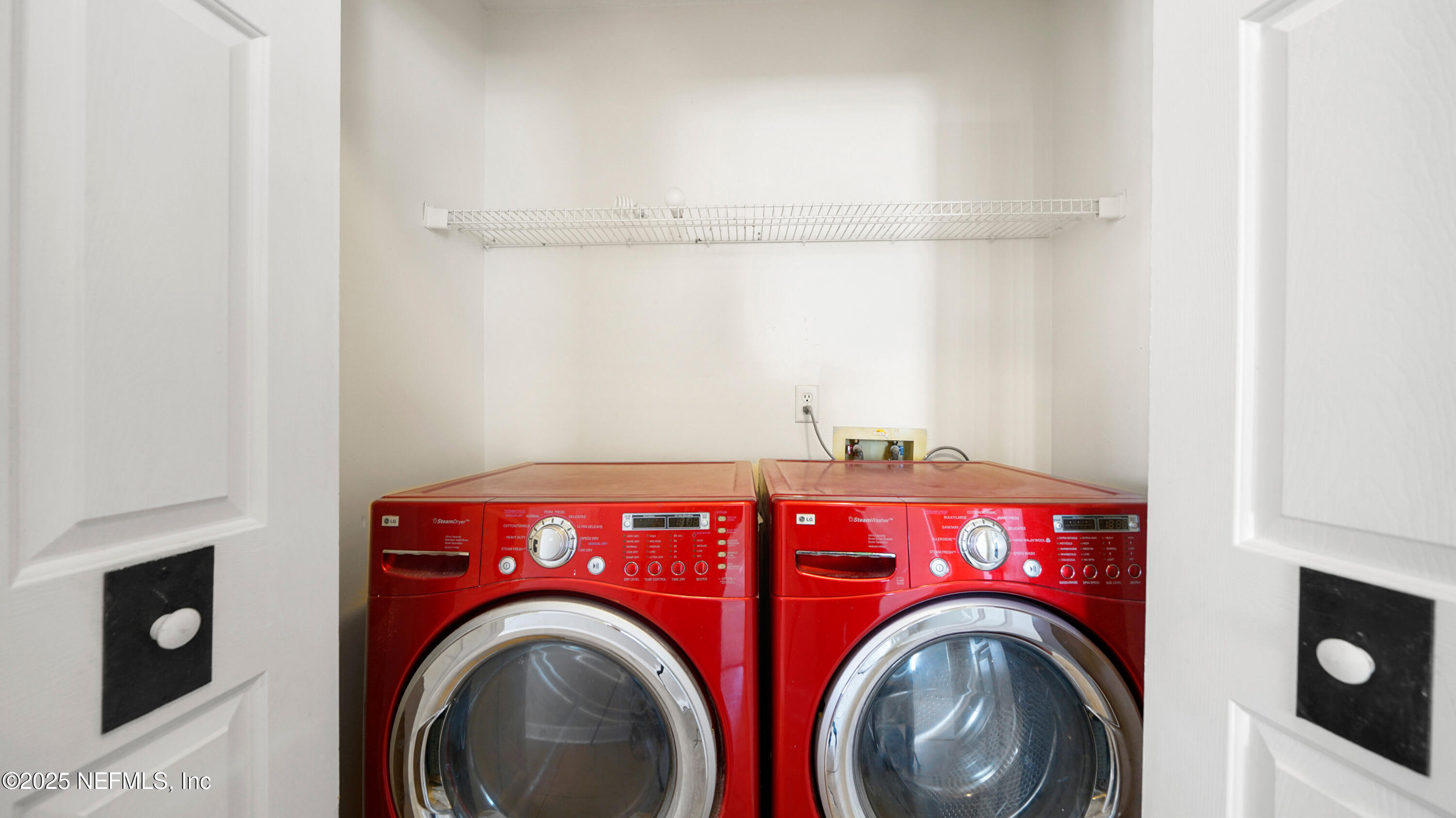 3255 Dowitcher Lane Orange Park, FL 32065 - Photo 21 of 27 a utility room with dryer and washer