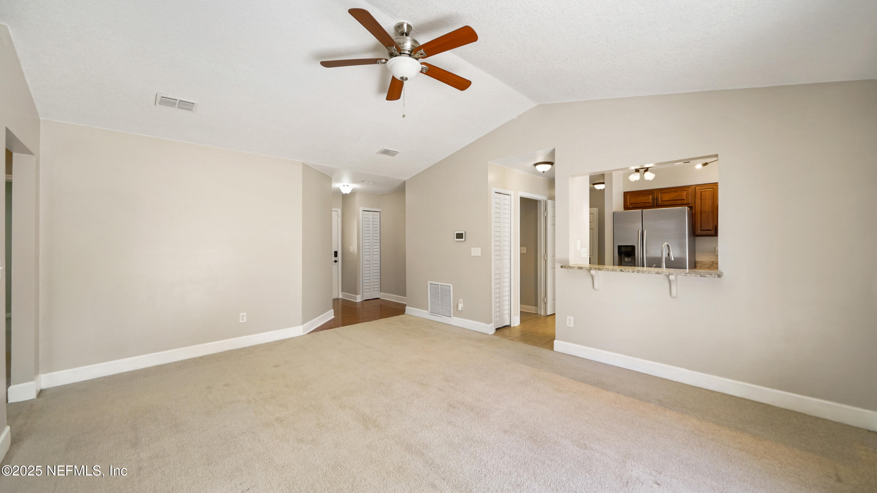 3255 Dowitcher Lane Orange Park, FL 32065 - Photo 3 of 27 an empty room with fan and windows
