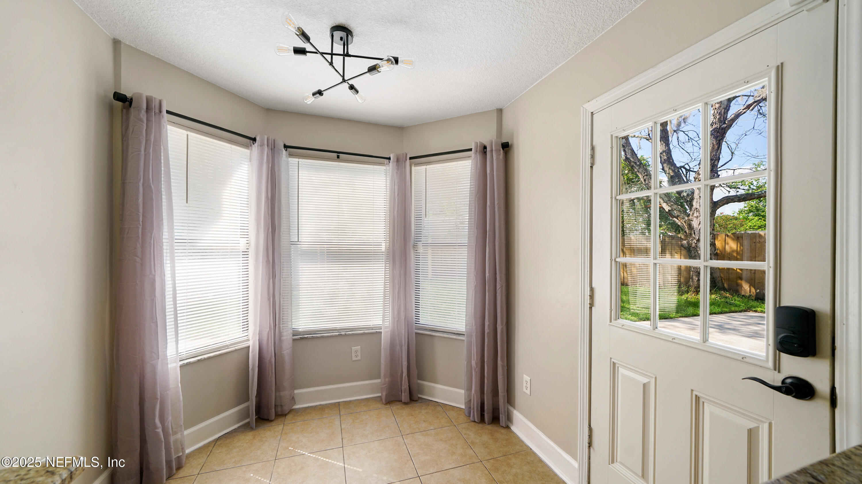 3255 Dowitcher Lane Orange Park, FL 32065 - Photo 5 of 27 a view of an empty room with a window