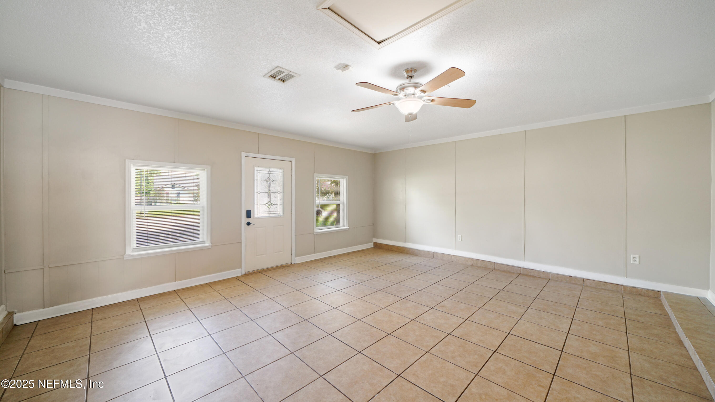 3255 Dowitcher Lane Orange Park, FL 32065 - Photo 7 of 27 a view of an empty room with a window