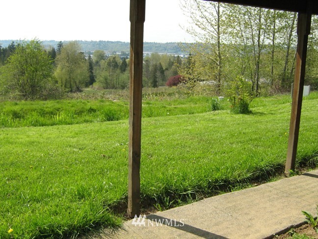 19215 98th Avenue South Renton, WA 98055 - Photo 20 of 23 a view of a yard with an outdoor seating