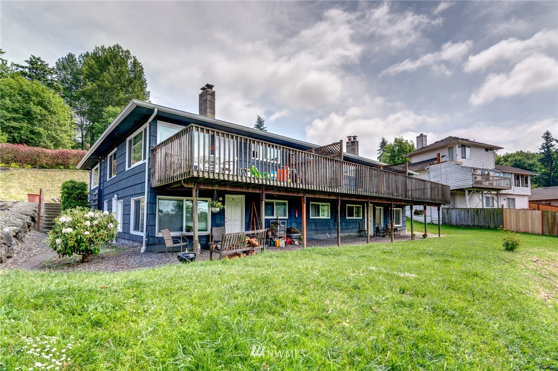 19215 98th Avenue South Renton, WA 98055 - Photo 6 of 23 a view of a house with a yard balcony and sitting area