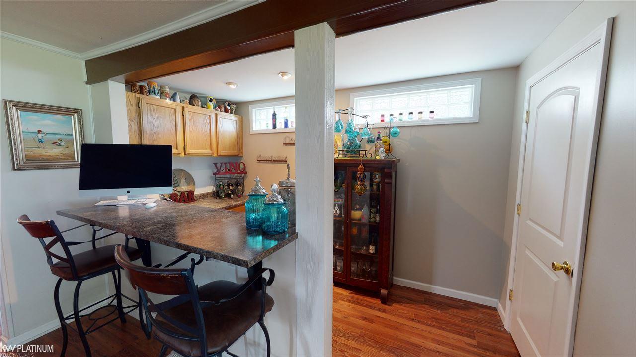 6013 Pointe Tremble Road Algonac, MI 48001 - Photo 7 of 26 Bar off of the living room