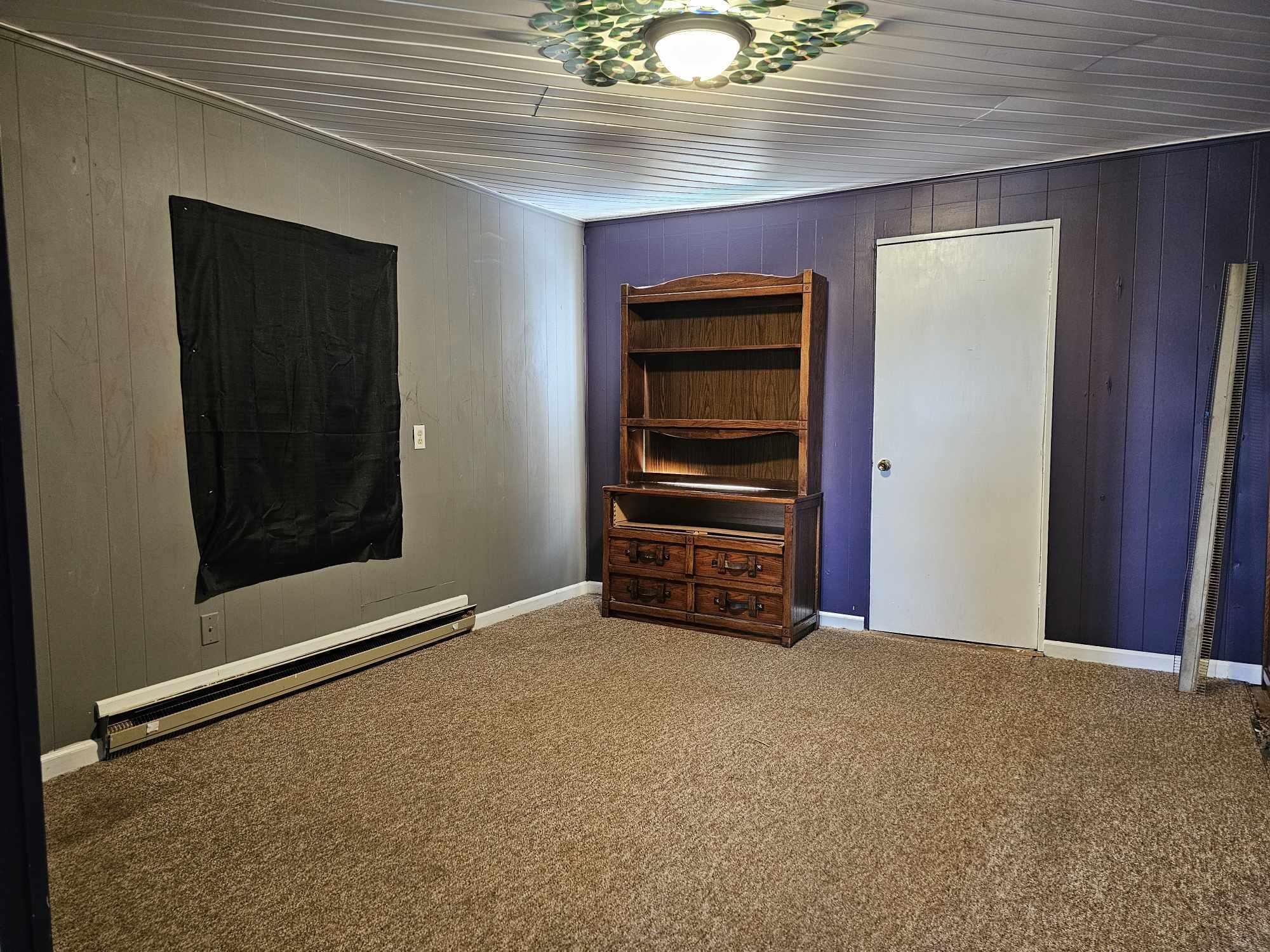 60 Wrays Chapel Road Rocky Mount, VA 24151 - Photo 8 of 11 a view of an empty room with a fireplace
