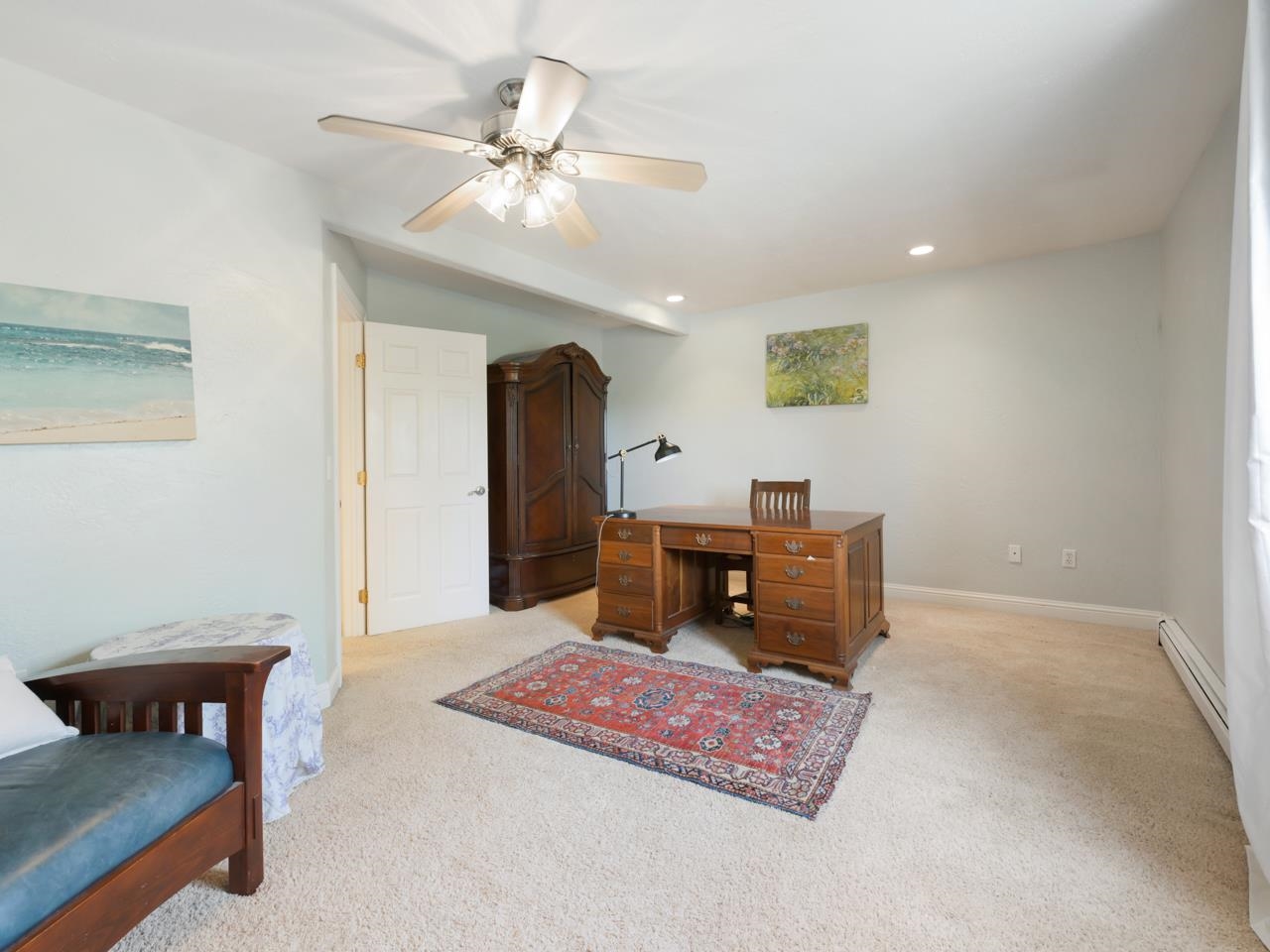 2433 H Road Grand Junction, CO 81505 - Photo 21 of 42 a living room with furniture and a chandelier