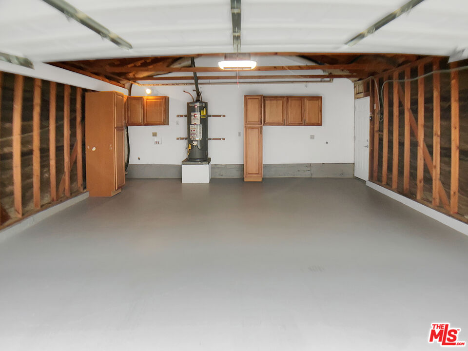 953 South Ridgecrest Circle Anaheim, CA 92807 - Photo 24 of 26 a view of empty room with wooden walls