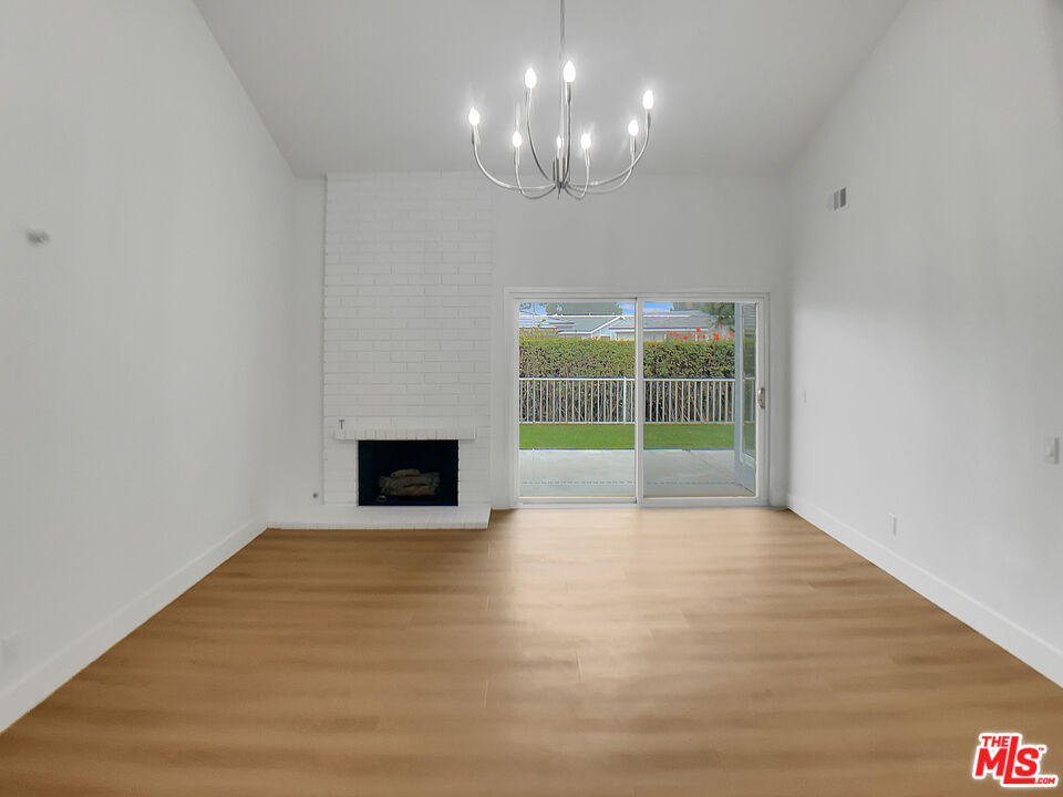 953 South Ridgecrest Circle Anaheim, CA 92807 - Photo 3 of 26 a view of a room with a large window