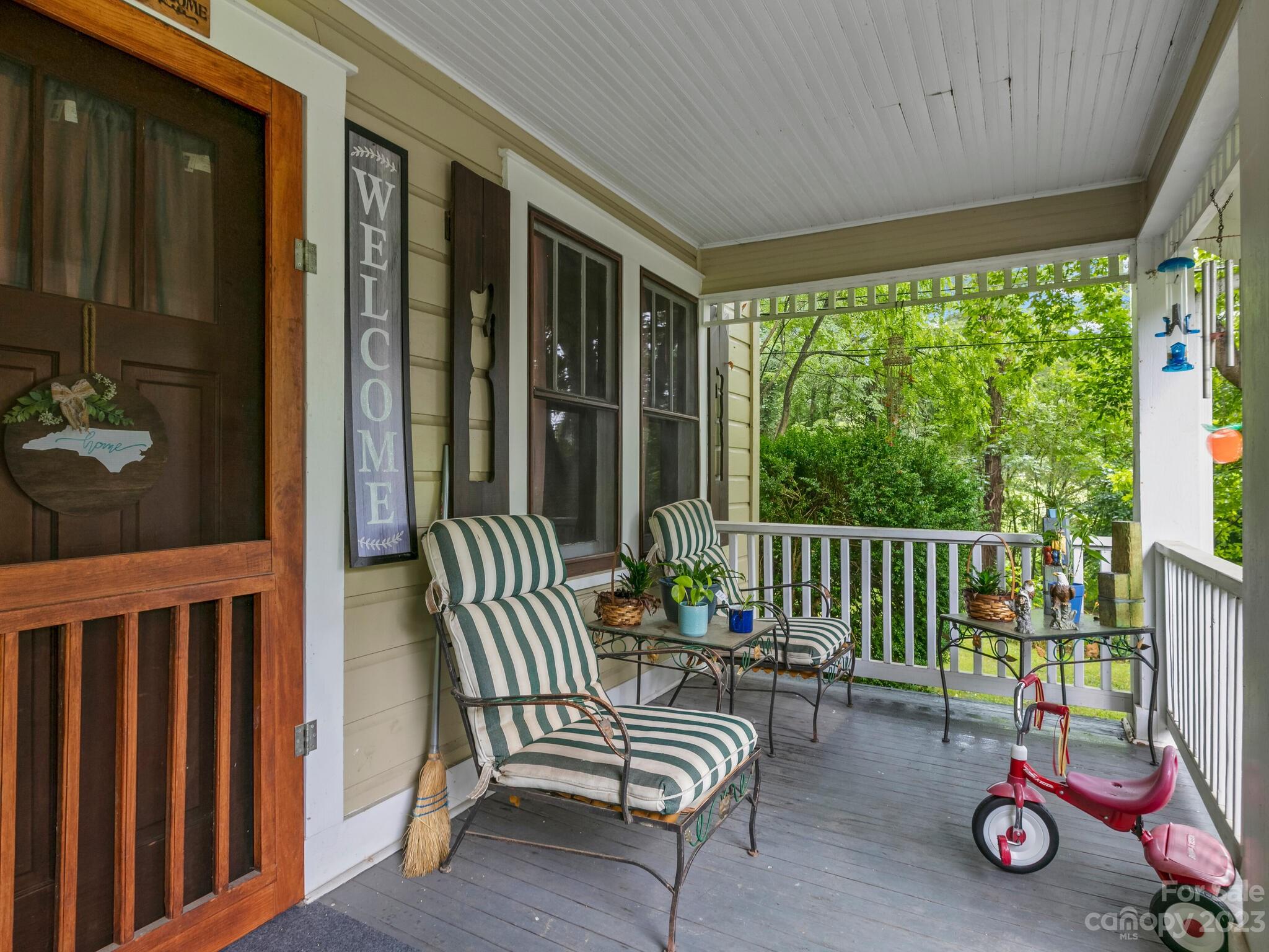 11 Hale Road Clyde, NC 28721 - Photo 4 of 25 a view of a two chairs in the balcony