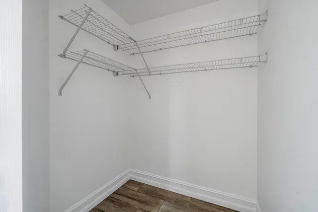 a view of a room with racks on the wall