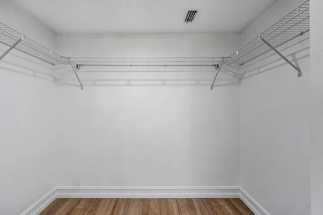 a view of a room with racks on the wall