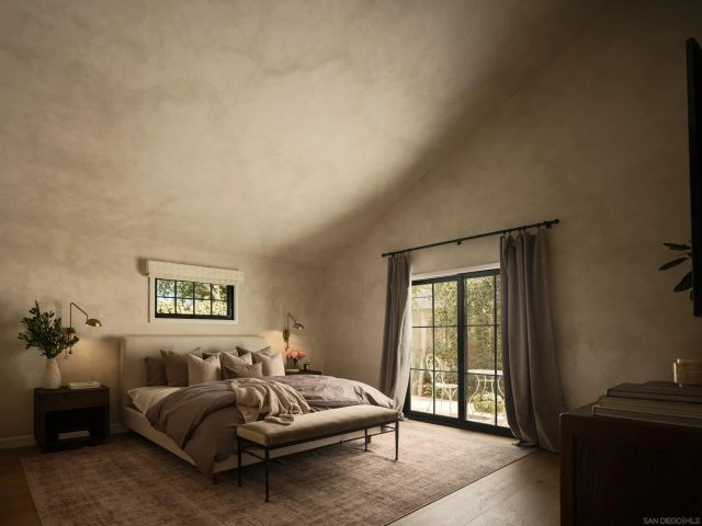 a spacious bathroom with a granite countertop double vanity sink mirror and a bathtub