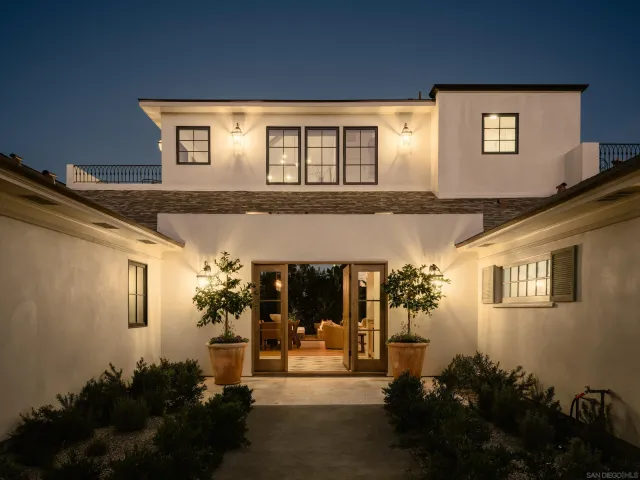 a front view of a house with a porch