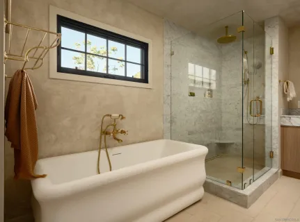 a bathroom with a granite countertop sink mirror toilet and bathtub