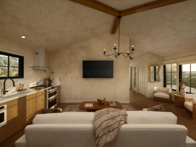 a front view of a building with a garden