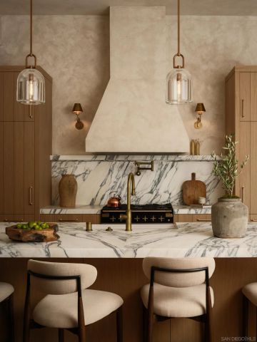 a kitchen with stainless steel appliances kitchen island granite countertop a refrigerator a stove and a sink with wooden floor