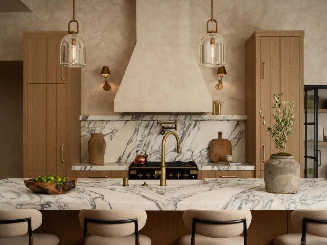 a kitchen with a stove and a refrigerator