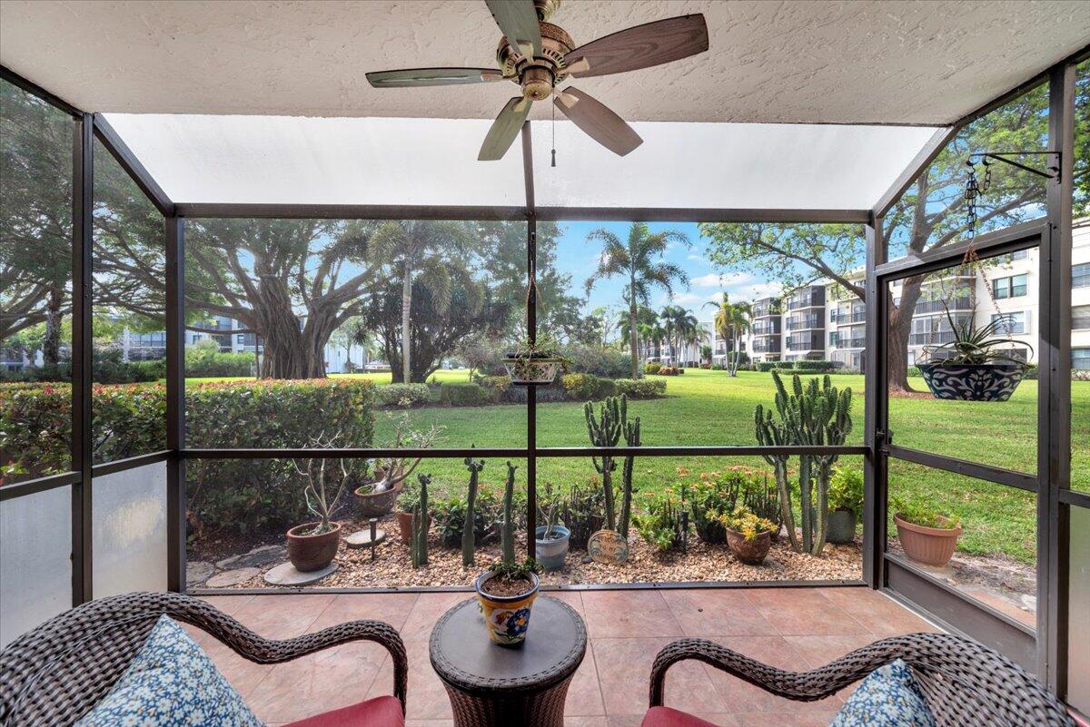 300 North Hwy A1A, Unit 104O Jupiter, FL 33477 - Photo 16 of 25 a living room with large windows