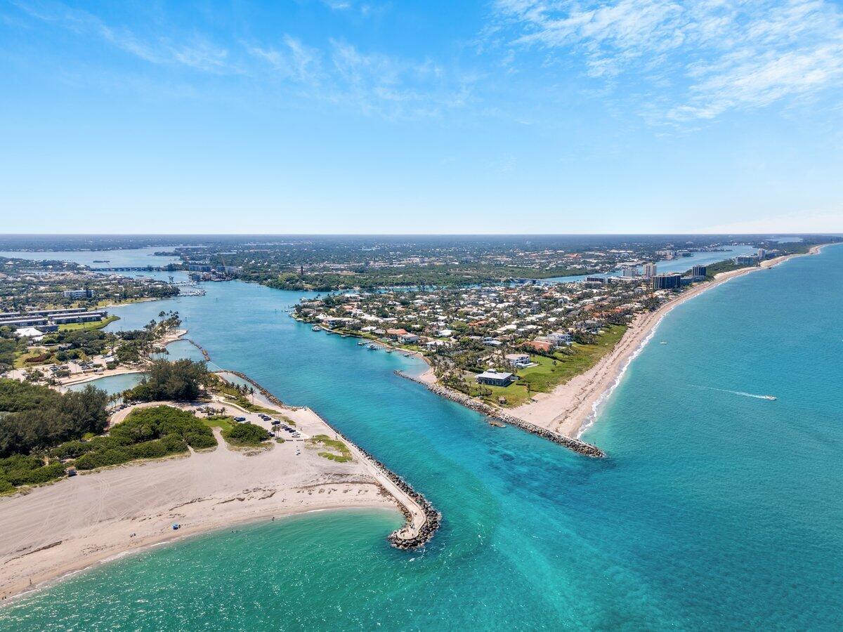 300 North Hwy A1A, Unit 104O Jupiter, FL 33477 - Photo 24 of 25 an aerial view of a residential houses with outdoor space and ocean view