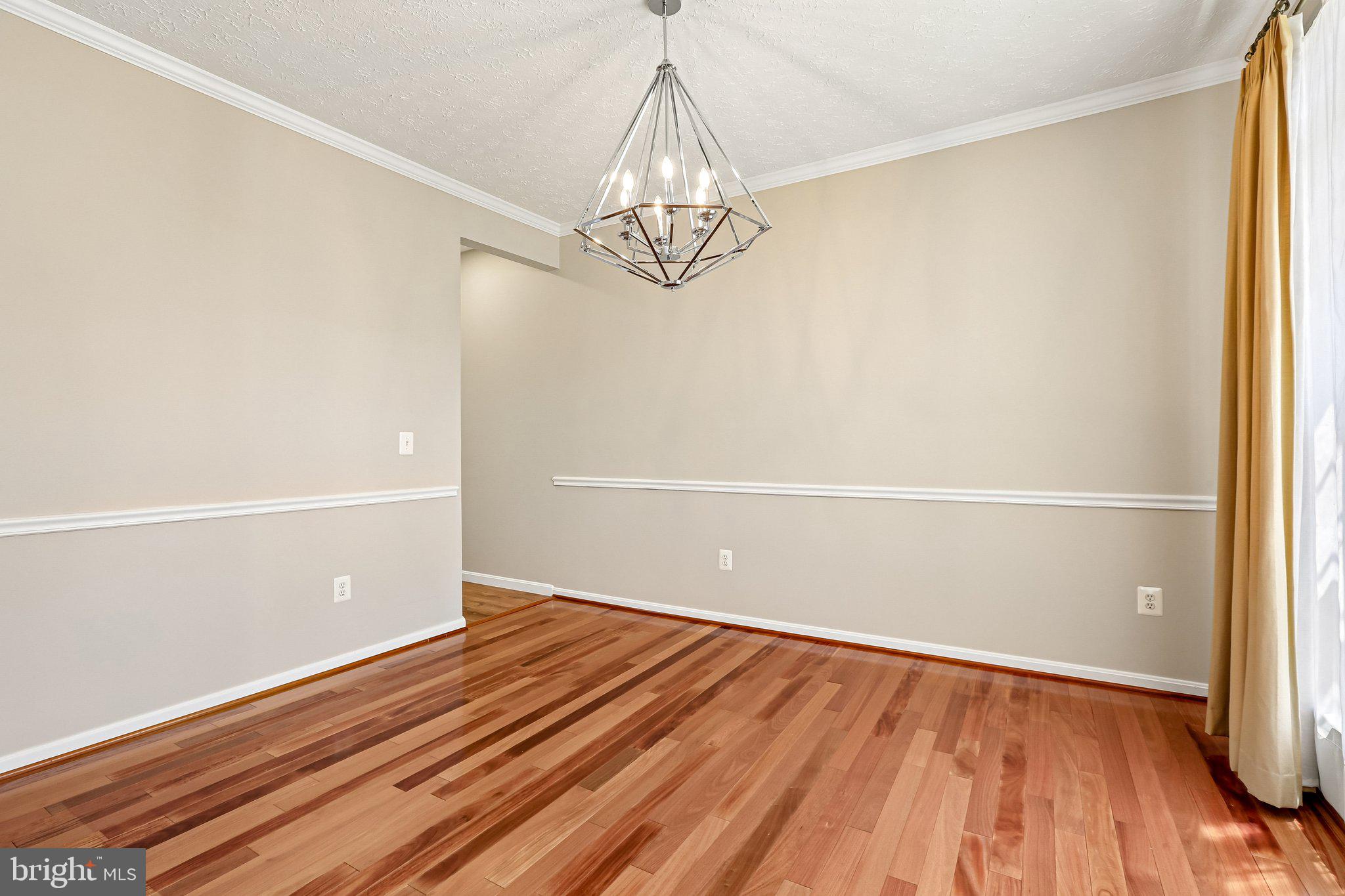 3157 Pyramid Circle Manchester, MD 21102 - Photo 12 of 67 Formal Dining Room with Crown & Chair Moldings
