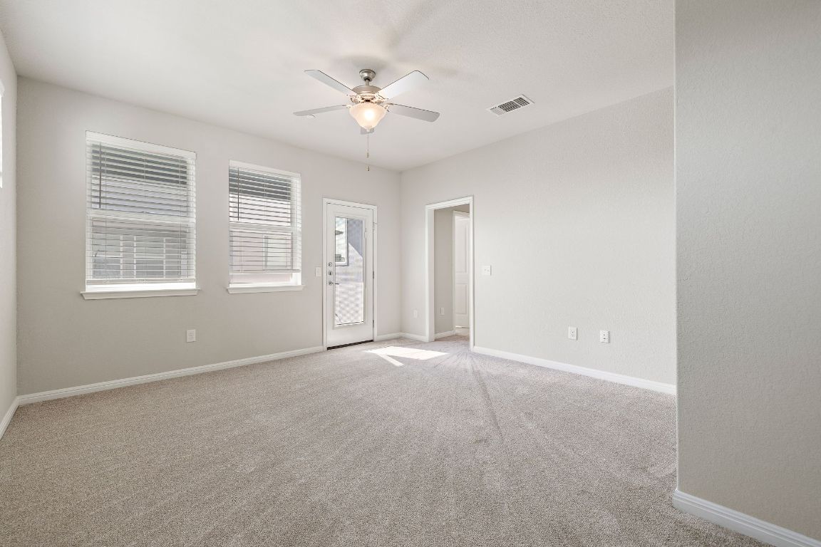 9015 Cattle Baron Path, Unit 504 Austin, TX 78747 - Photo 15 of 36 a view of an empty room with a window