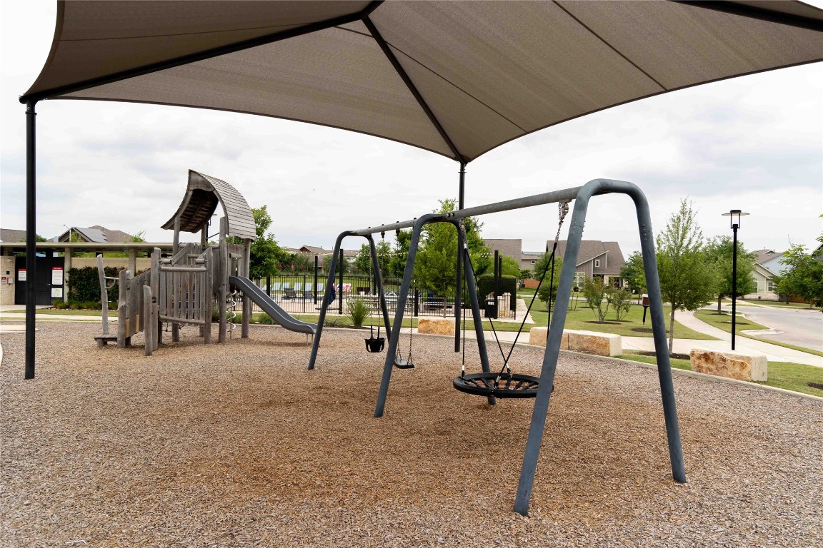 9015 Cattle Baron Path, Unit 504 Austin, TX 78747 - Photo 24 of 36 a view of outdoor space with seating